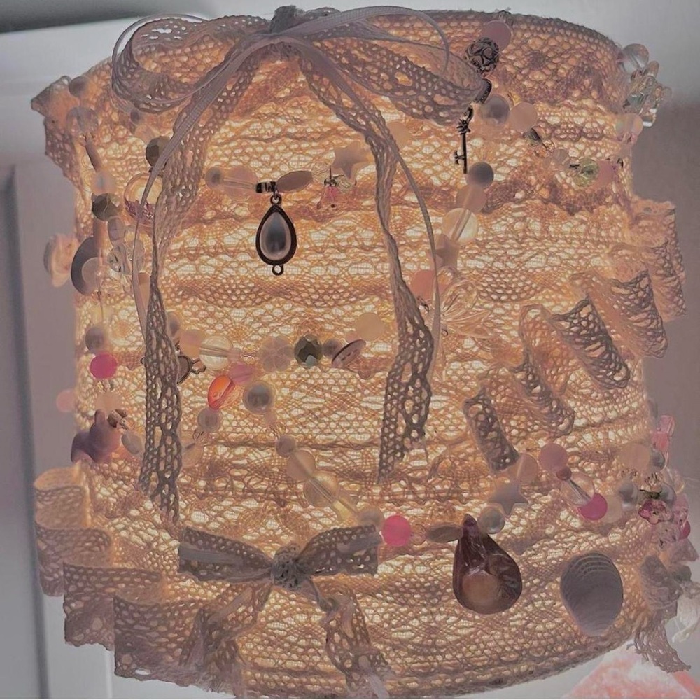 handmade DIY lace beaded lampshade with ribbon on glass base